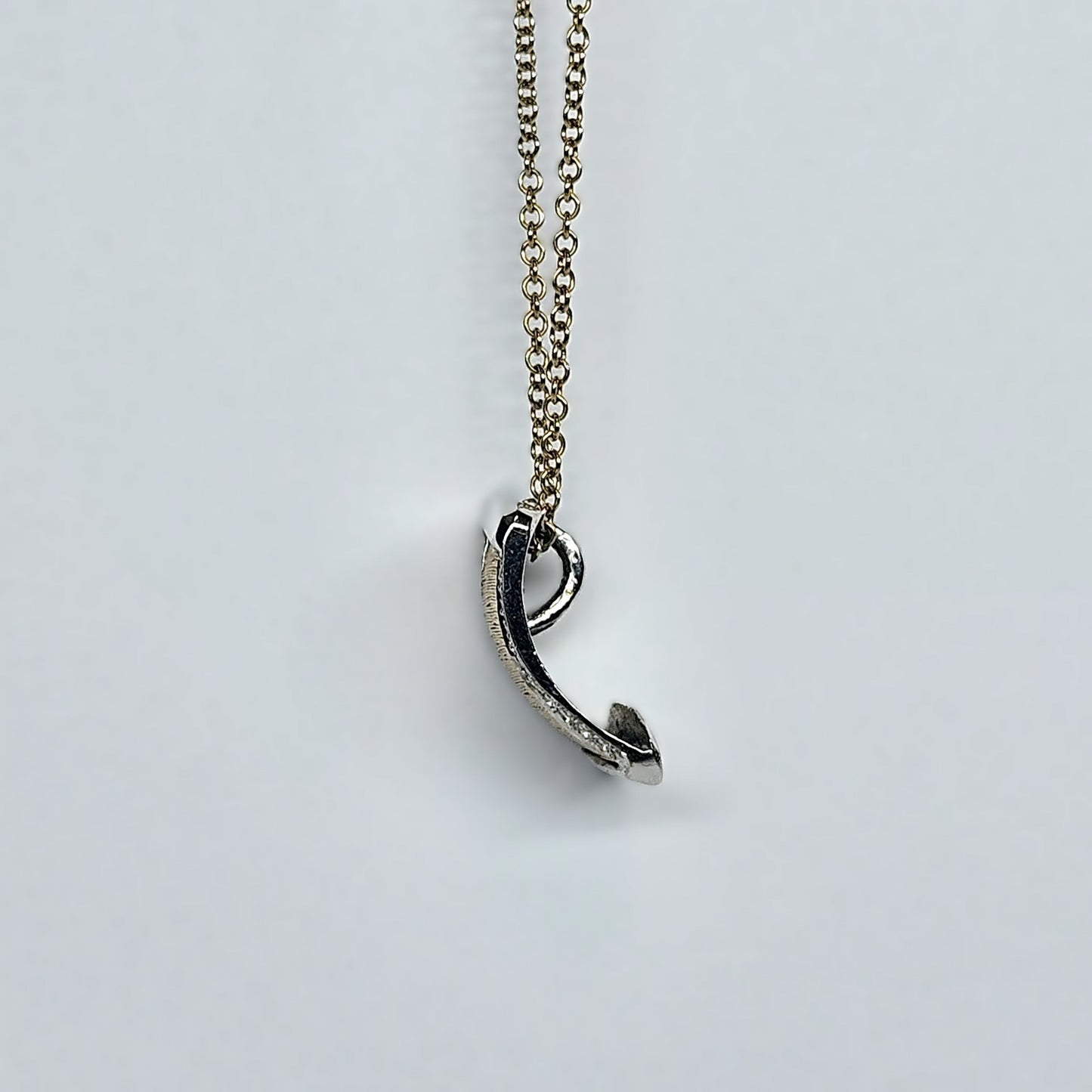 Woven, Diamond set pendant with chain.